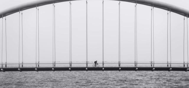 Bicyclist on a Bridge